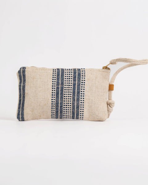 Textured clutch bag with blue and black pattern on a white background