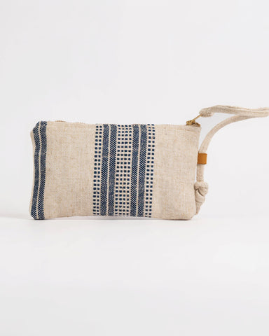 Textured clutch bag with blue and black pattern on a white background