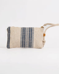 Textured clutch bag with blue and black pattern on a white background
