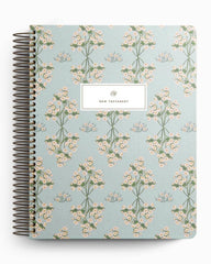 Notebook with floral pattern on a light blue background