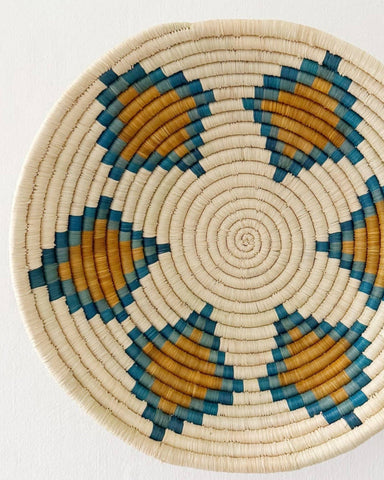Add a uniquely ethical touch to your home decor with the Mbayo handwoven...