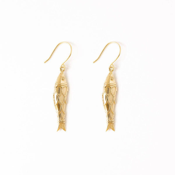 Gold fish-shaped earrings on a white background