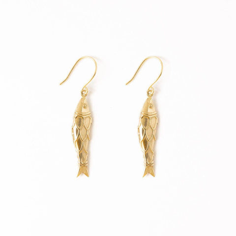 The Dimensional Dangle Fish Earrings are handmade by skilled artisans in...