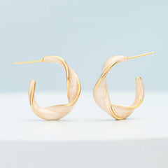 With a Twist Hoops in Soft Coral