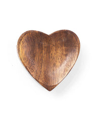 Wooden heart-shaped object on a white background