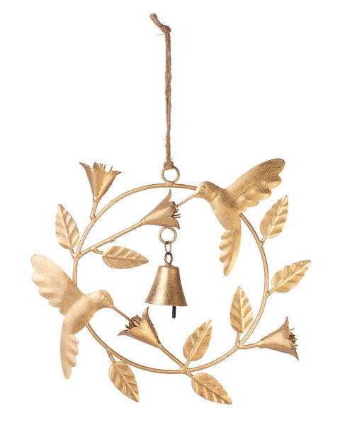 Decorative gold wind chime with birds and leaves on a white background