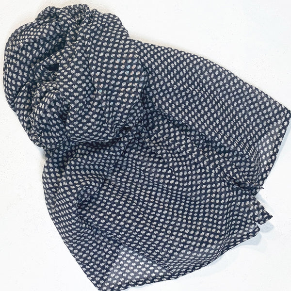 Navy blue fabric with white pattern on a white background