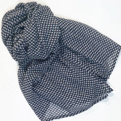 Navy blue fabric with white pattern on a white background