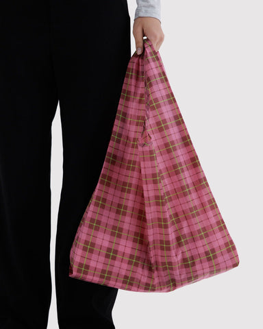 Pink plaid reusable bag with 'BAGGU' logo on a white background