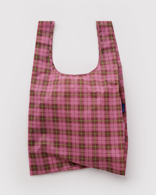 Pink and green plaid reusable bag on a white background