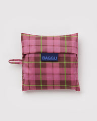 Pink plaid reusable bag with 'BAGGU' logo on a white background