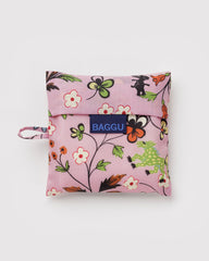 Floral-patterned reusable bag with 'BAGGU' logo on a light gray background
