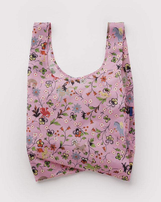 Floral-patterned reusable bag on a white background
