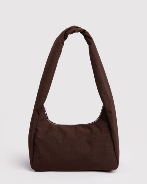 Brown shoulder bag on a light gray background