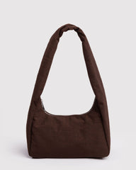 Brown shoulder bag on a light gray background