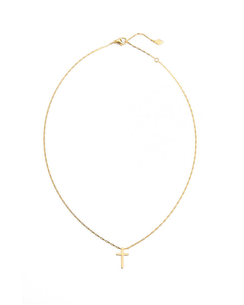 Gold necklace with a cross pendant on a white background