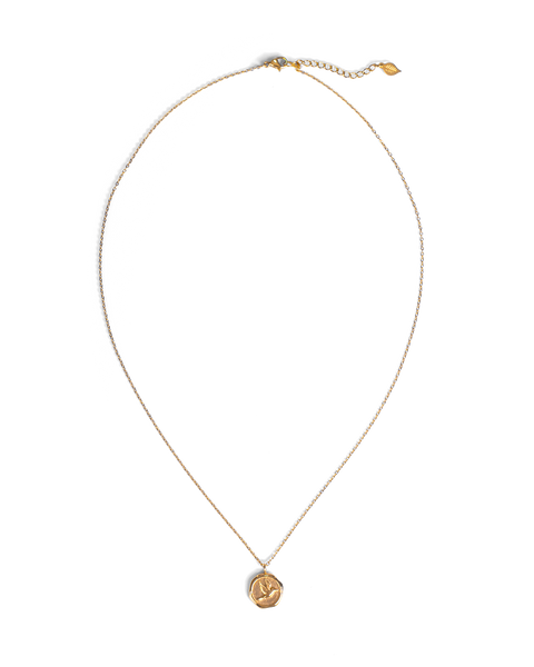 A delicate gold chain necklace with a small, textured gold pendant featuring a bird