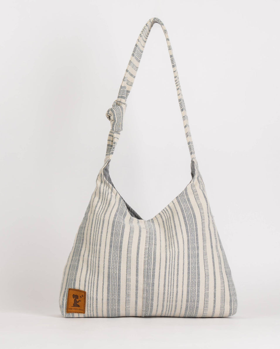Striped handbag on a white background