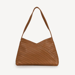 Brown handbag with a textured pattern on a white background