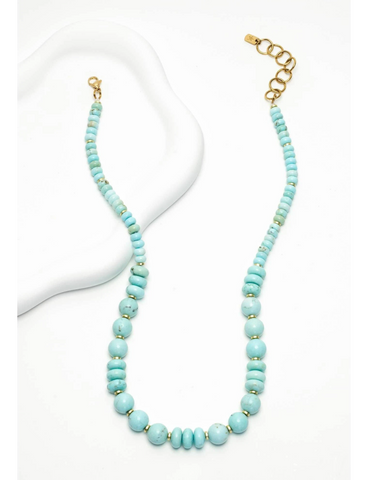 Hand-beaded turquoise and finished with hematite accents, this adjustabl...