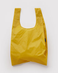 Yellow reusable bag on a white background