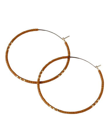 Amp up your beauty with these ethically made colorful beaded hoops.
Our ...