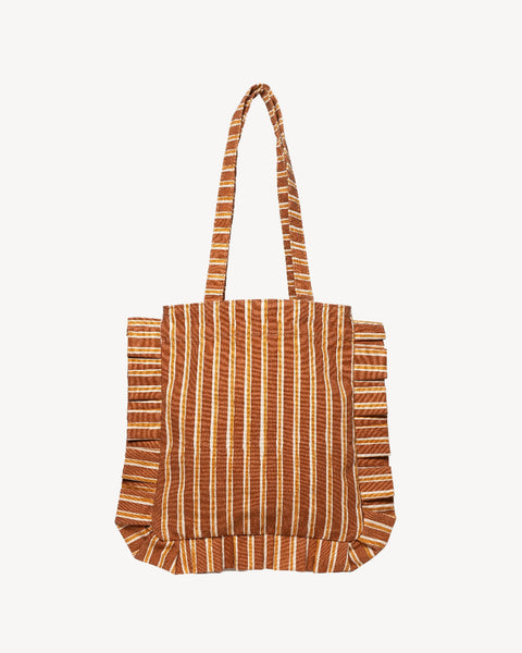 A striped fabric tote bag with brown and beige vertical stripes and ruffled edges, shown against a plain off-white background.