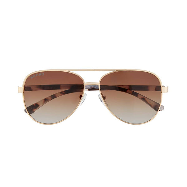 A pair of aviator-style sunglasses with a gold-tone metal frame and gradient brown lenses, shown against a plain white background.