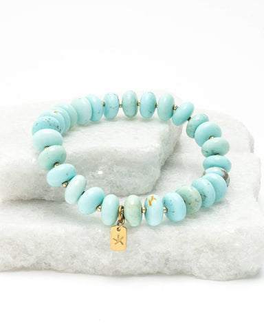 Bold, dreamy turquoise beads come together in this statement bracelet de...