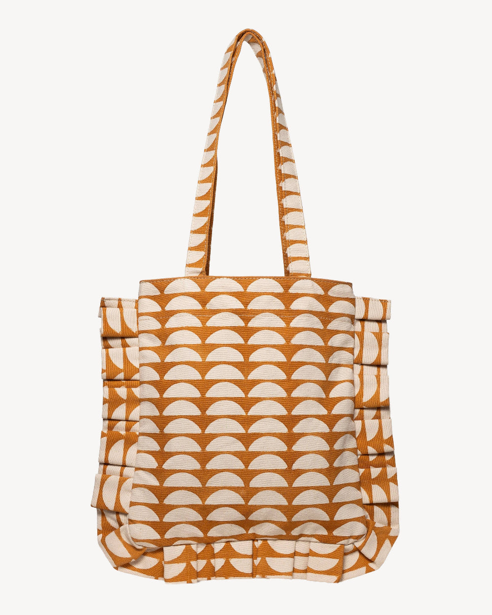 A tote bag featuring a repeating geometric pattern of semi-circles in a warm ochre orange and cream, with matching shoulder straps, shown against a plain off-white background.