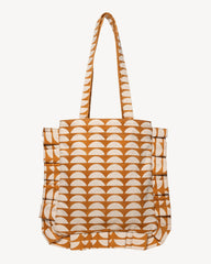 A tote bag featuring a repeating geometric pattern of semi-circles in a warm ochre orange and cream, with matching shoulder straps, shown against a plain off-white background.