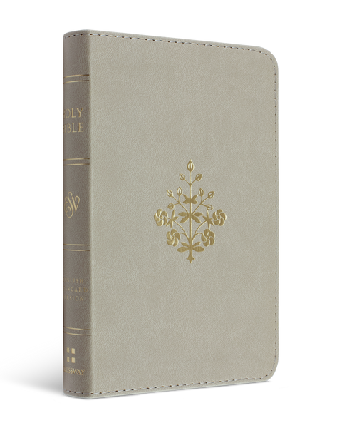 Gray notebook with a decorative gold emblem on a white background
