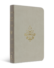 Gray notebook with a decorative gold emblem on a white background