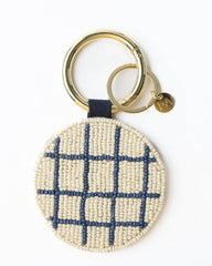 Keychain with grid pattern on a white background