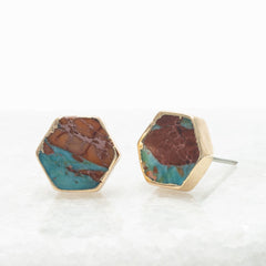 Hexagonal earrings with turquoise and brown stone inlays on a white background