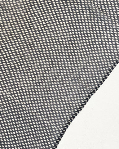 Three patterned scarves in orange, blue, and pink on a white background
