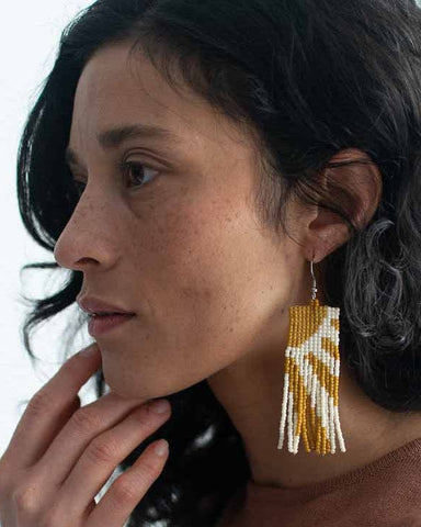 These fair trade beaded earrings are the perfect statement piece among y...
