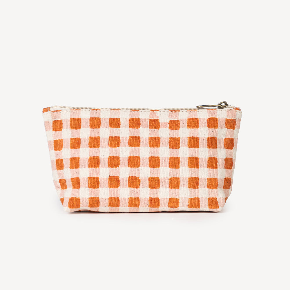 Checkered pouch with orange and white pattern on a white background