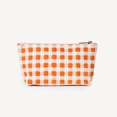 Checkered pouch with orange and white pattern on a white background