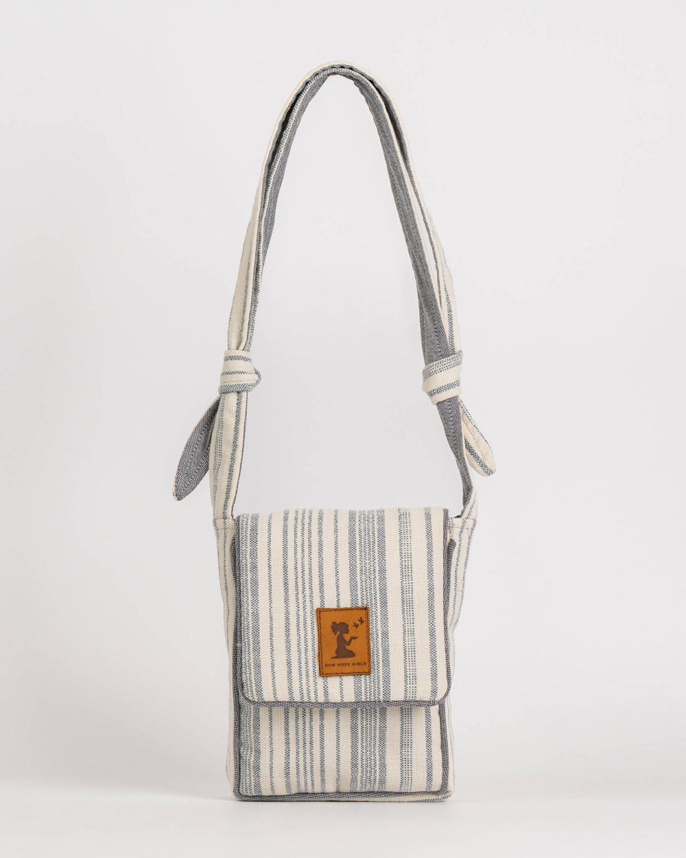 Fabric bag with a strap on a white background