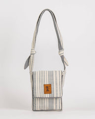 Fabric bag with a strap on a white background