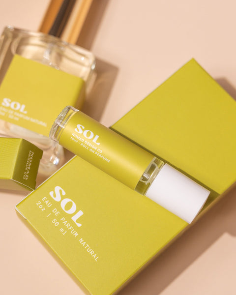 SOL perfume bottle and packaging on a beige background