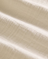 Close-up of beige fabric texture