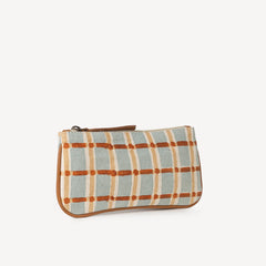 Plaid patterned pouch on a white background