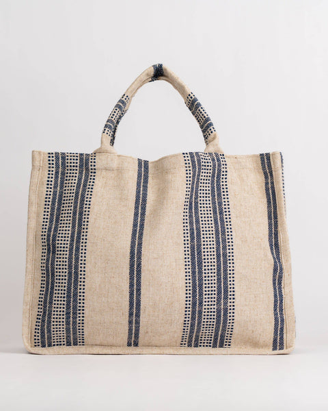 Beige tote bag with navy stripes on a white background