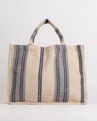 Beige tote bag with navy stripes on a white background